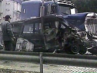 Van crushed by a truck