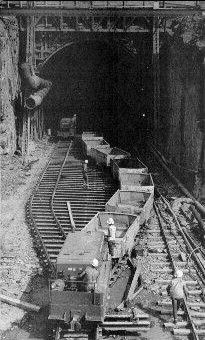 Railcars removing rock from the excavation of the Blue-Kittatinny Mountain