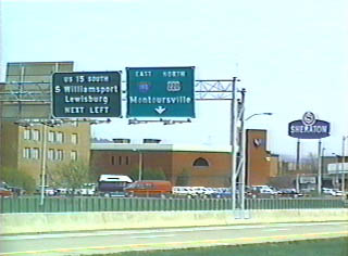 Overhead gantry on a street parallel to Interstate 180