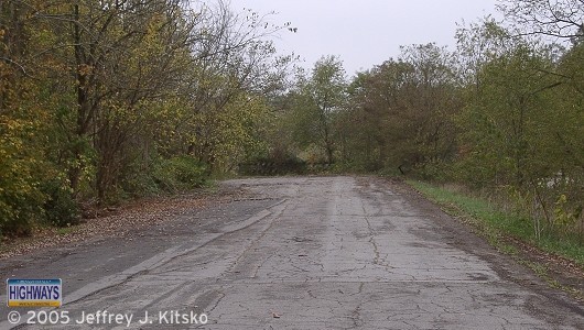 A section of PA 88 at the Low Hill Road intersection that was abandoned when the expressway was completed in 1977