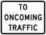 Image of a To Oncoming Traffic Sign (R1-2AP)