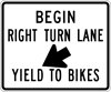 Image of a Right Turn Lane/Bikes Sign (R4-4)