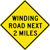 Image of a Winding Road Next (__) Miles Sign (W1-5-1)