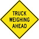 Image of a Truck Weighing Ahead Sign (W14-9)