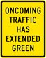 Image of a Oncoming Traffic Has Extended Green Sign (W25-1)