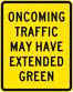 Image of a Oncoming Traffic May Have Extended Green Sign (W25-2)