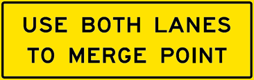 Use Both Lanes To Merge Point Sign (W36-101) Image of a Use Both Lanes To Merge Point Sign (W36-101)